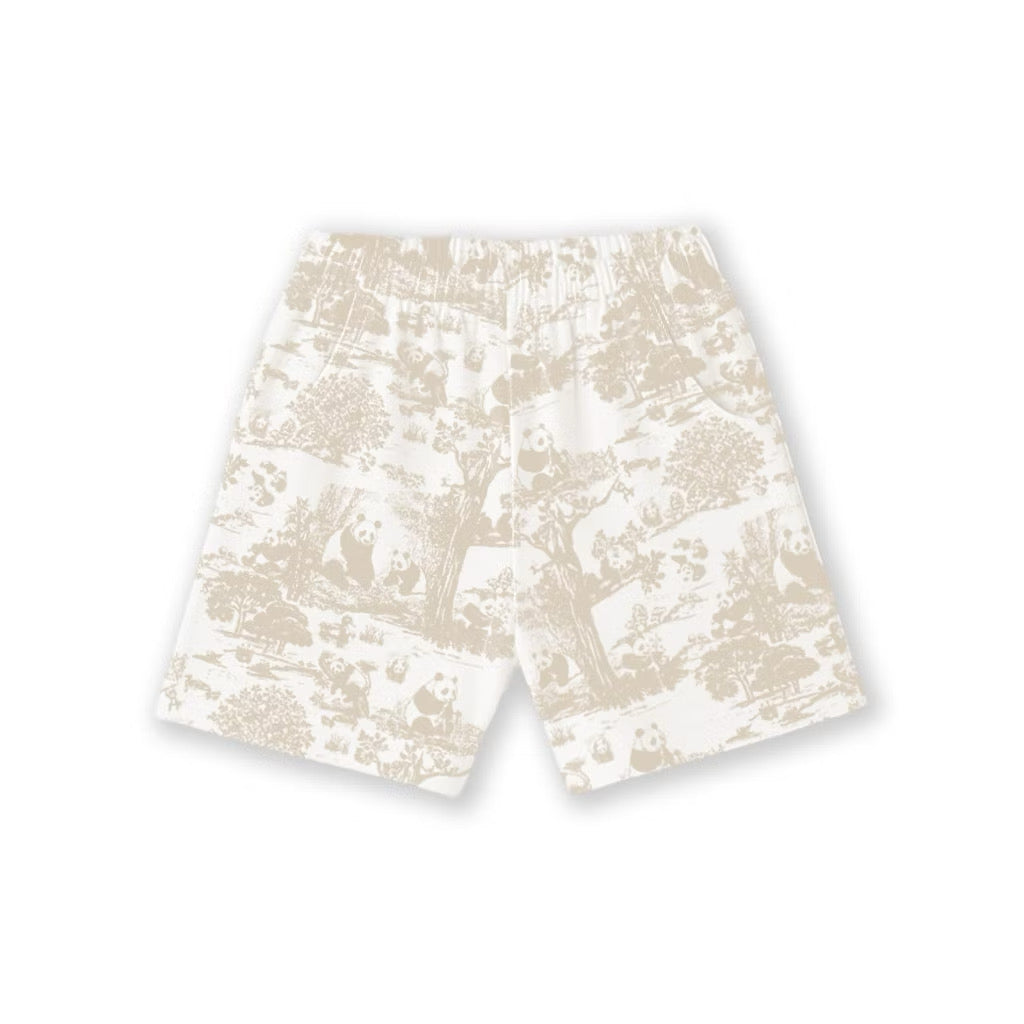 Beige bamboo kids pyjama shorts with subtle pattern on a white background — soft, breathable, eczema-friendly sleepwear.