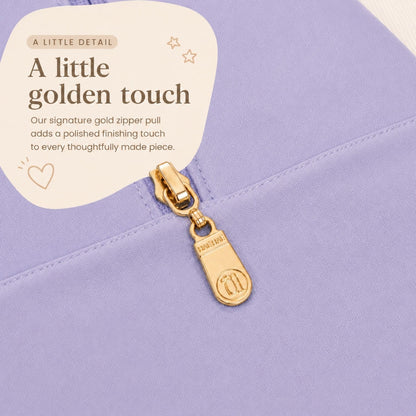 Farmer's Market signature gold Hae Hae zipper pull detail